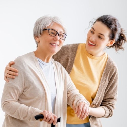 Carer supporting a client with mobility
